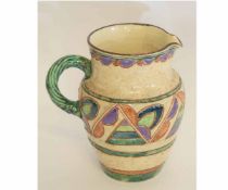 Pottery jug with geometric Art Deco incised design and rope handle, the jug impressed Collard