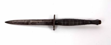 Mid-20th century SFS type fighting knife with double edged blade to an oval steel cross-guard and