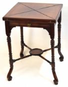 Late 19th century mahogany envelope card table with folding top and frieze drawer, 54cms wide