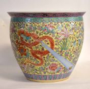 Very large 20th century Chinese porcelain jardiniere with polychrome designs of dragons and