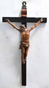 Wooden crucifix with resin figure of Christ on the cross, 56cms high