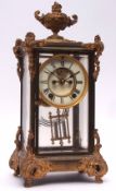 Late 19th/early 20th century American gilt four glass mantel clock, the plinth shaped case