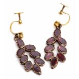 Pair of late Georgian garnet drop earrings each featuring 8 oval flat cut garnets in closed