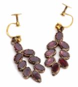 Pair of late Georgian garnet drop earrings each featuring 8 oval flat cut garnets in closed