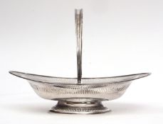 George V swing handled table basket of oval form with cast and applied reeded rim and hinged