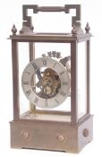 20th century brass cased electric timepiece, the five glass plinth shaped case with carry handle