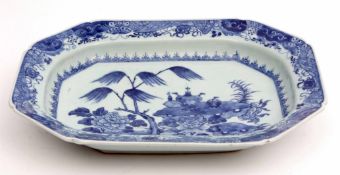 Chinese export late 18th century serving dish decorated in underglaze blue with peony and a table