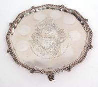Edward VI silver salver of shaped circular form with cast and applied rim and engraved field with