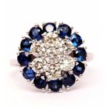 18ct white gold, diamond and sapphire cluster ring a centre of seven brilliant cut diamonds raised