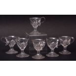 Set of six 19th century glass custard cups, faceted bodies, waisted stems and star cut bases, 9cm