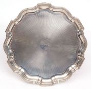 George VI salver of shaped circular form with engine turned centre and initialled cartouche and