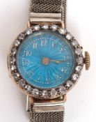 Early 20th century yellow metal gem set and enamelled cocktail watch, frosted and gilt movement,
