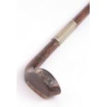 Late 19th century walking cane modelled in the form of a golf club, the handle formed as a walnut