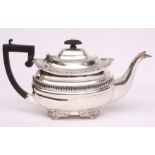 Edward VII tea pot of oval form with hinged and domed cover, cast and applied flared rim and