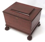 Regency period mahogany wine cooler, sarcophagus top with beaded edge over original zinc lined