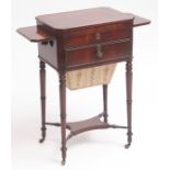 Early 19th century mahogany work/writing table of canted rectangular form, the lifting lid enclosing