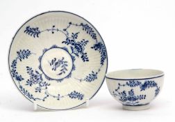 Lowestoft tea bowl and saucer decorated in Meissen style with the so-called Immortelle pattern, with