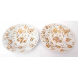 Two Meissen dishes decorated with moulded trailing flowers picked out in gilt, 28cm diam, blue