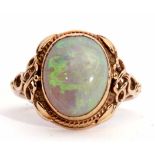 Late 19th/early 20th century opal ring, the cabochon oval shaped opal 12 x 10mm collet set between