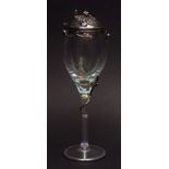 Gdansk white metal mounted and lidded wine glass with hinged cover, applied throughout with acorns