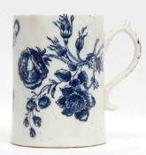 Lowestoft mug with scroll handle decorated in underglaze blue with floral prints and butterflies,