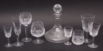 Waterford "Lismore" pattern suite of table glass comprising six 19cm champagne flutes, three 13cm