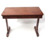 Regency period mahogany side table, of rectangular form, the frieze with two drawers raised on