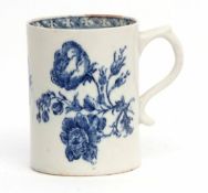 Small Lowestoft mug with scroll handle, circa 1780, decorated in underglaze blue with floral