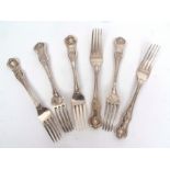 Six early Victorian Kings Honeysuckle pattern dinner forks with Union shell heels, crested with