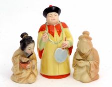 Group of three early 20th century Royal Worcester candle snuffers, one modelled as a Mandarin and