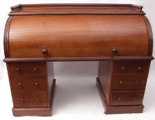 Victorian mahogany large cylinder desk, galleried top over a fitted interior with drawers,