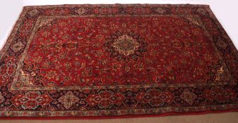 Fine modern Keshan carpet, triple-gull border, central panel of twining foliage, mainly red and blue