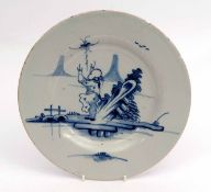 Unusual mid-18th century Delft plate, probably London, modelled with a Chinaman attempting to