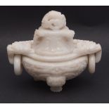 Chinese white jade tripod covered censer, the lid with reticulated dragon finial and three loop