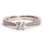 Precious metal single stone diamond ring featuring a round brilliant cut diamond, 0.35ct approx,