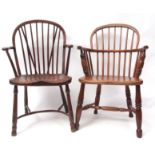 Two 19th century oak/elm stick back Windsor armchairs with solid seats, one with crinoline