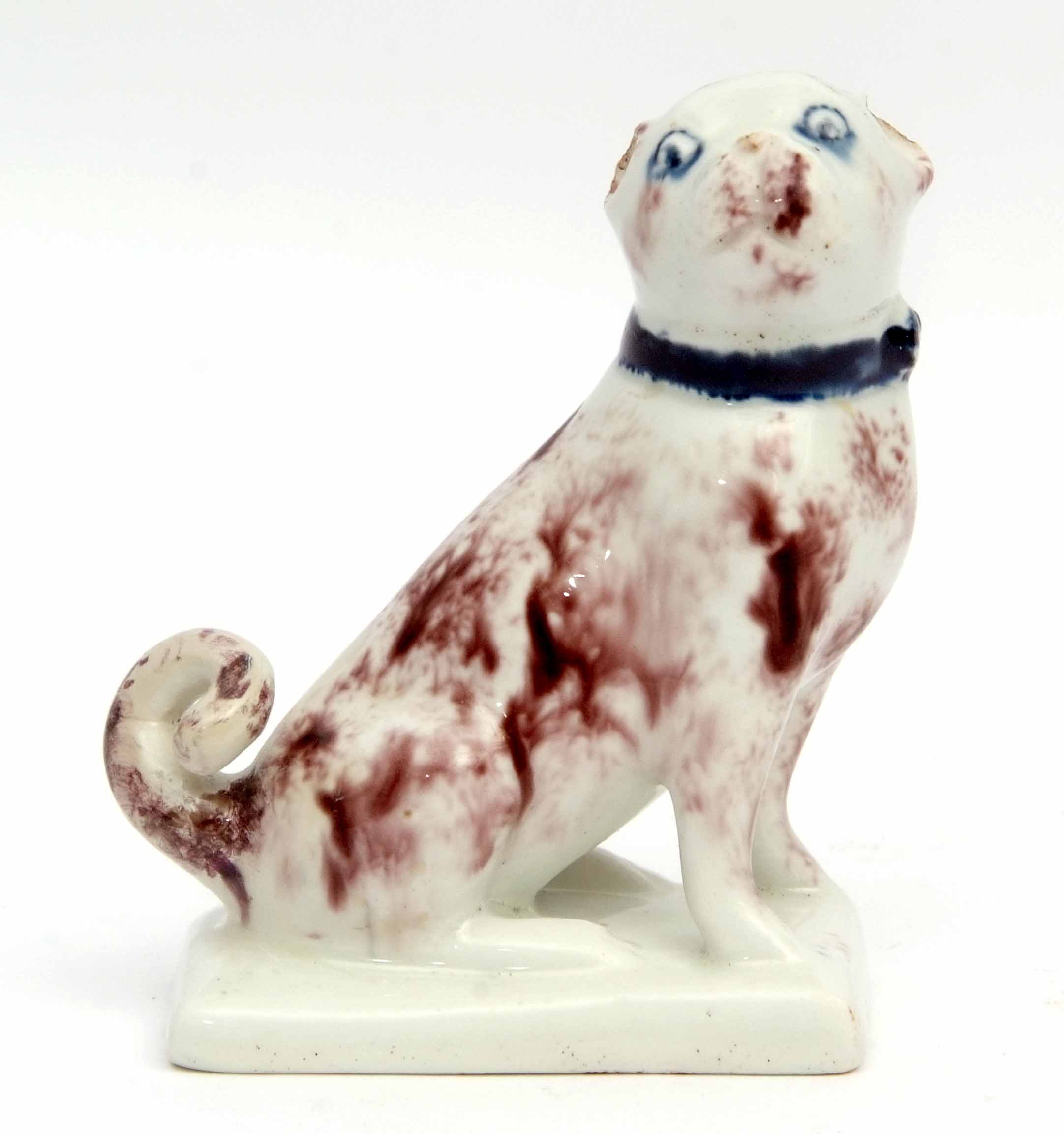 Very rare Lowestoft model of a pug dog, the animal sits on its haunches on a rectangular base, the