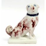 Very rare Lowestoft model of a pug dog, the animal sits on its haunches on a rectangular base, the