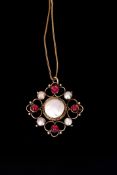 Early 20th century Arts & Crafts open work pendant, the centre with a large circular blister