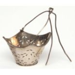 Dutch tea strainer modelled in the form of a shaped oval pail with applied rope twist rim and