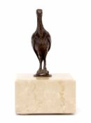 Small unsigned bronze study of a standing crane on a faux marbled base, 11cm high