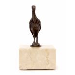 Small unsigned bronze study of a standing crane on a faux marbled base, 11cm high