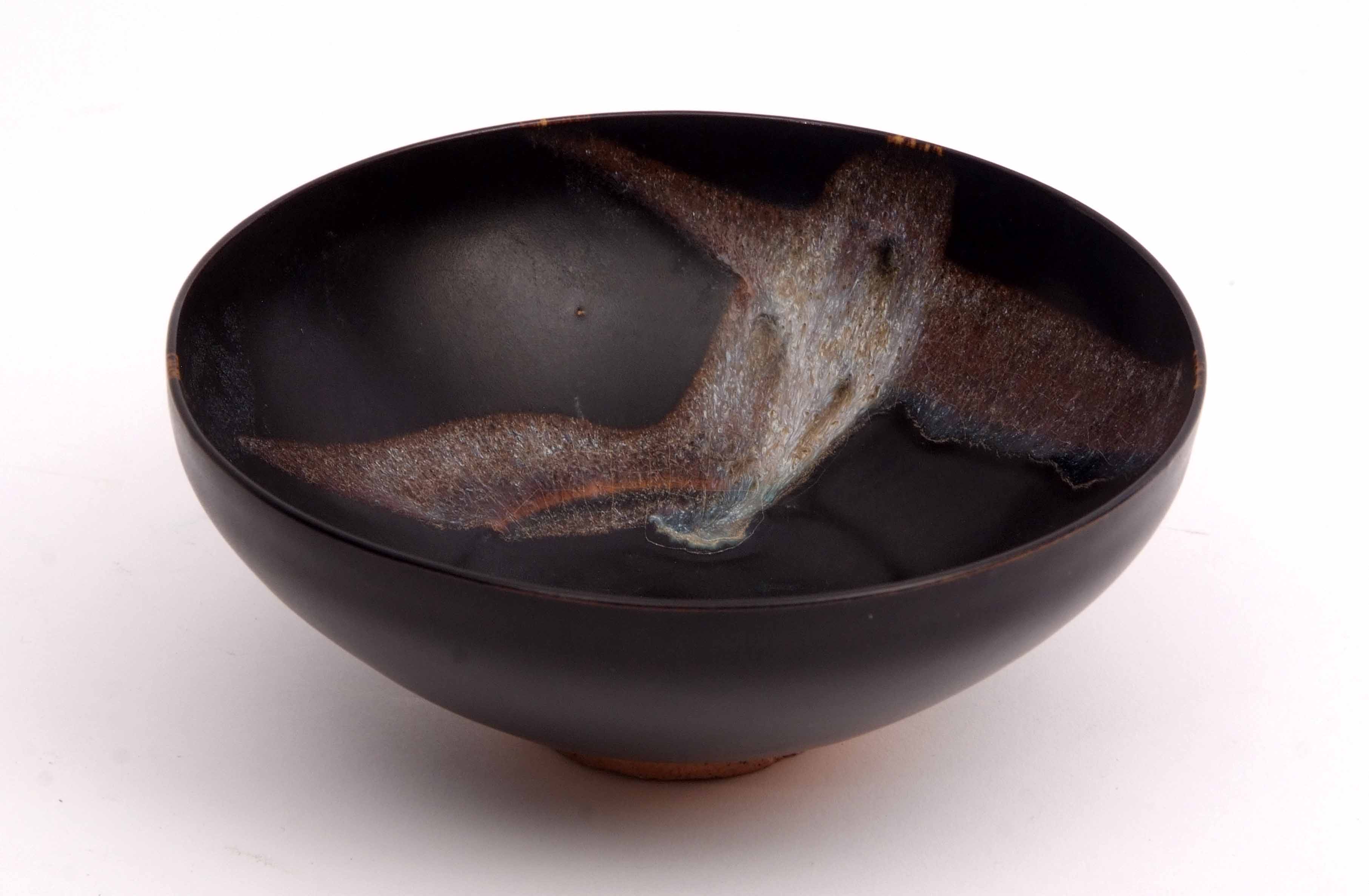 Unusual Chinese Studio Pottery bowl, black glazed with splashed silver type decoration, 15cm diam