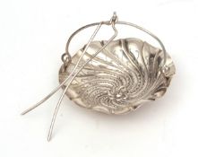 19th century French silver tea strainer of pierced and wrythen circular form with wire work handle