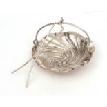 19th century French silver tea strainer of pierced and wrythen circular form with wire work handle