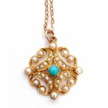 18ct stamped turquoise and seed pearl pendant featuring a circular turquoise within a seed pearl