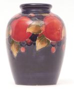 Mid-20th century Moorcroft vase, the globular body decorated with the pomegranate pattern with