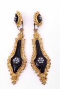 Pair of Victorian pendant mourning earrings, lozenge shaped, a design with a central small opal