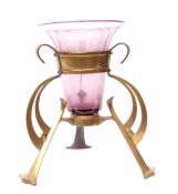Arts & Crafts style jardiniere with mauve glass inset, raised on decorative brass support with