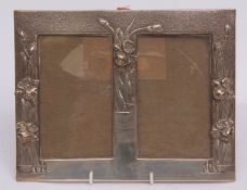 Early 20th century American silver mounted double photograph frame of rectangular form with embossed